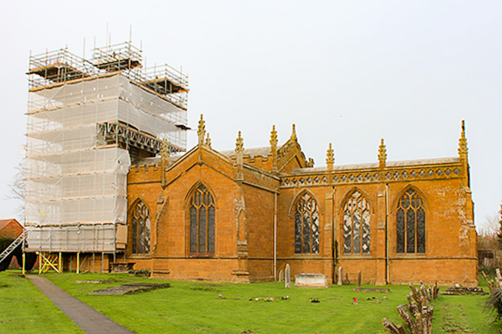 Tube and firring access scaffold for heritage conservation works on Kineton Church with beam over the nave