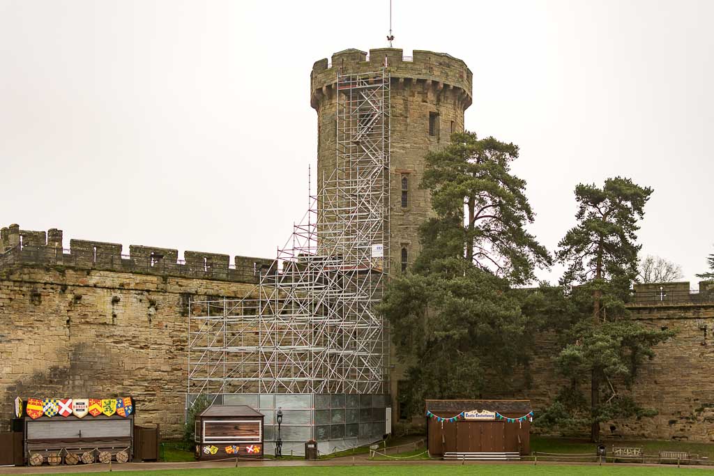 Buttressed access scaffold and staircase for stone replacement works at Warwick Castle