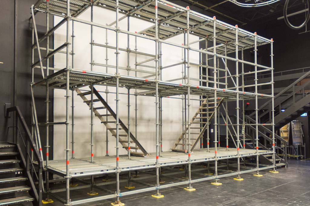 Designed scaffold for a production at Stratford-upon-Avon college with staircase accesses to upper level