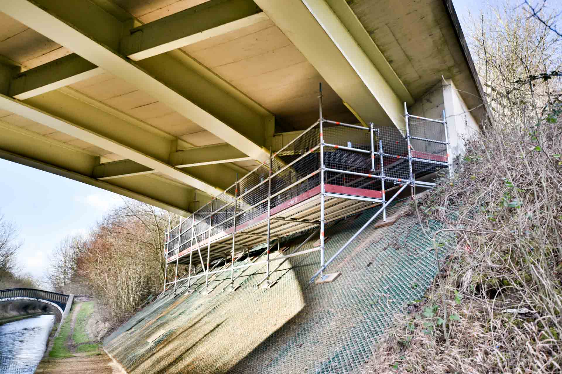 Bespoke access scaffold beneath a road bridge over the Oxford Canal near Banbury