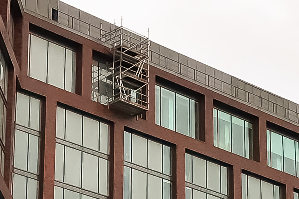 Cantilver droplift scaffold erected on the roof of Merrion House in Leeds for window replacement.