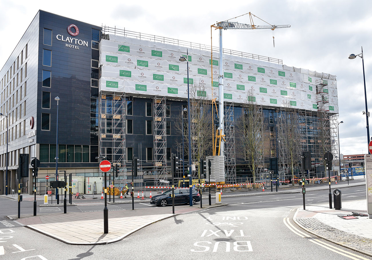 External view of temporary roof scaffold erected on structural towers in Birmingham